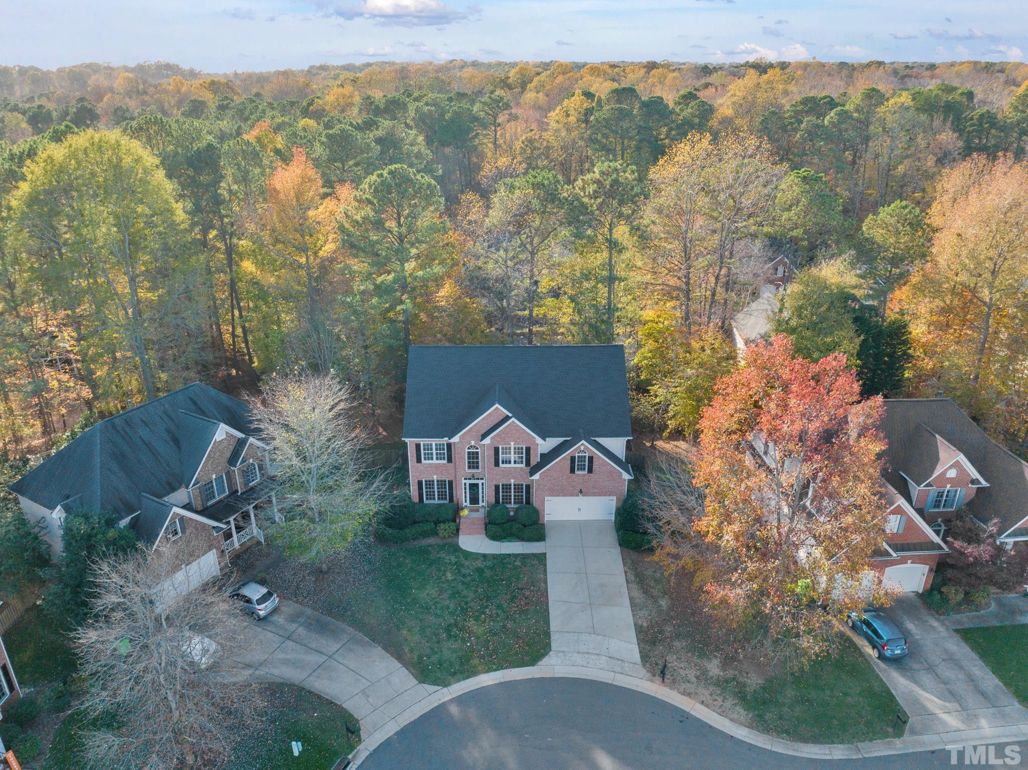 8409 Aptos Court Raleigh, NC 27613 - Photo 4 of 46 an aerial view of a house with a yard