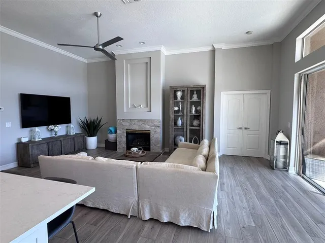 a bathroom with a granite countertop sink mirror and shower