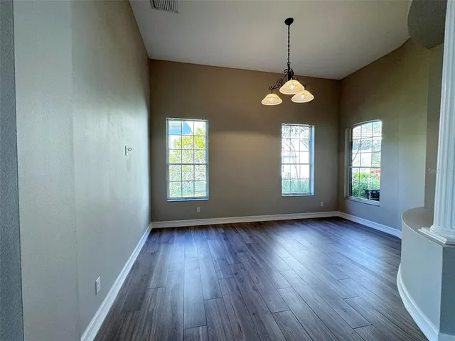 a view of living room with a floor to ceiling window