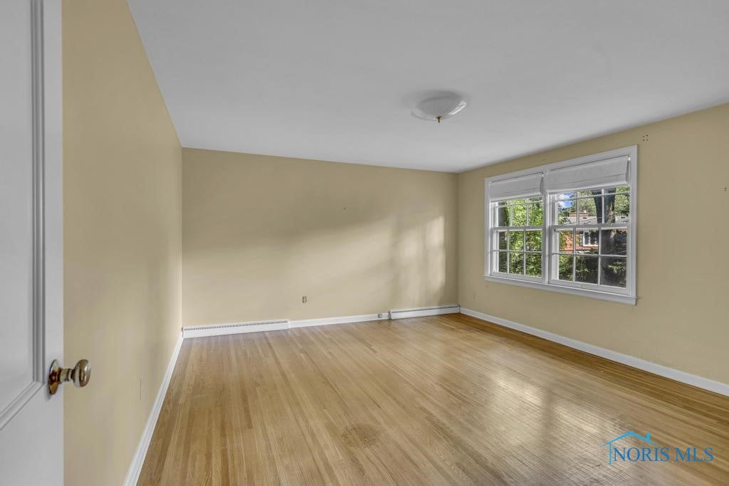 3432 Corey Road Toledo, OH 43615 - Photo 26 of 38 Upstairs bedroom with gorgeous hardwood floors