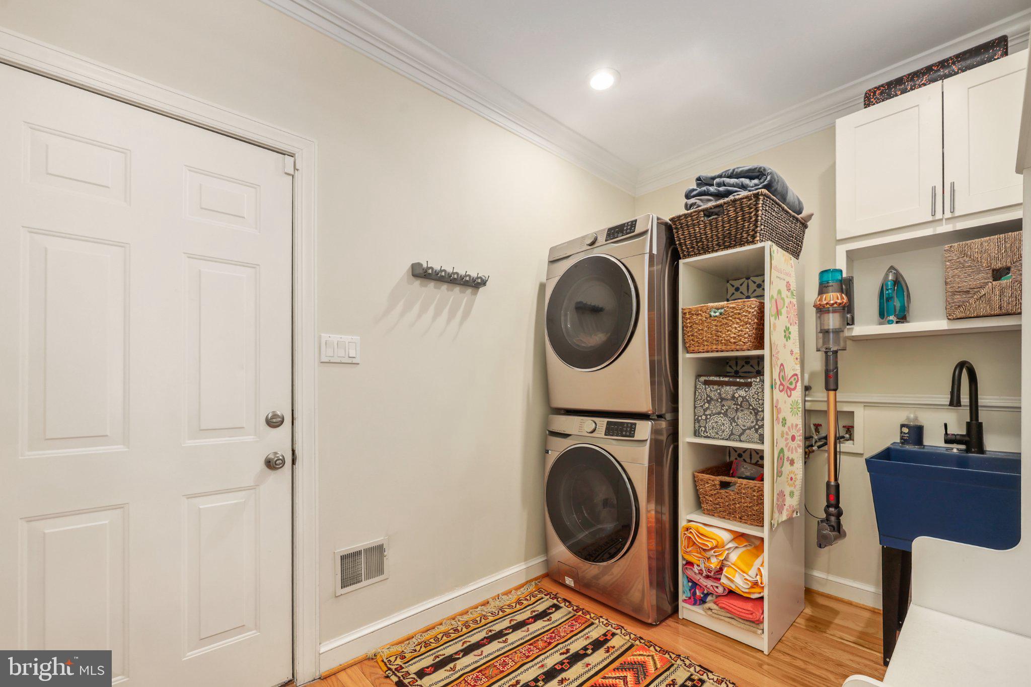 6732 Churchill Road McLean, VA 22101 - Photo 26 of 71 Stylish laundry nook with modern appliances.