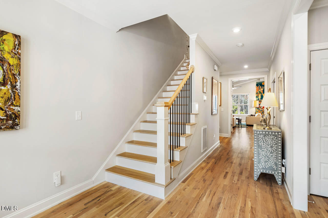 45 Post Oak Road Chapel Hill, NC 27516 - Photo 9 of 89 a view of entryway with wooden floor and stairs