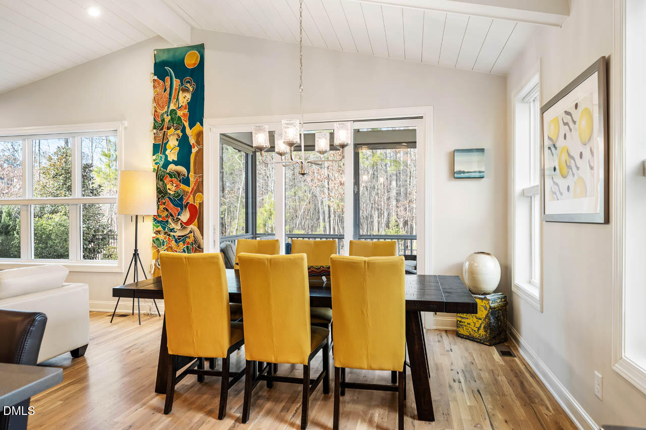 45 Post Oak Road Chapel Hill, NC 27516 - Photo 16 of 89 a view of a dining room with furniture window and wooden floor