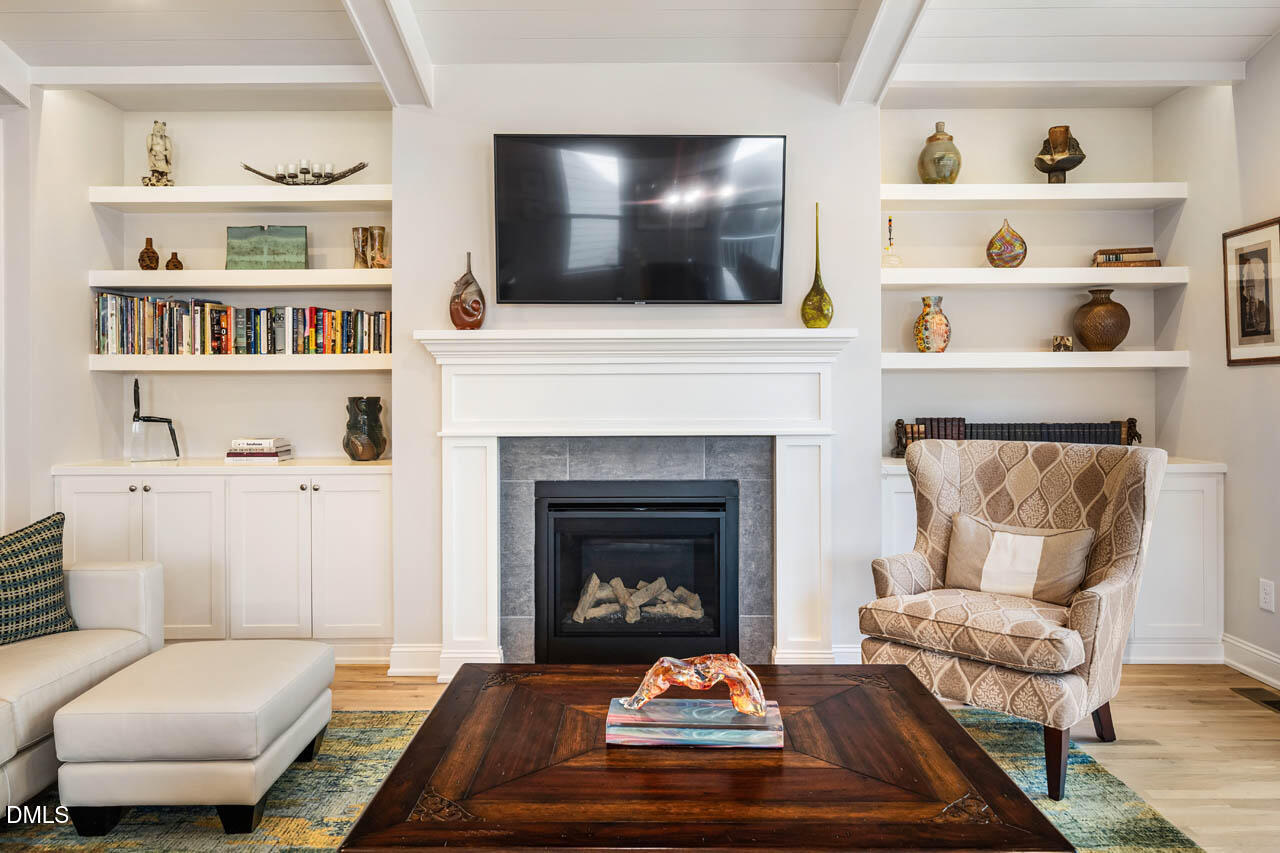 45 Post Oak Road Chapel Hill, NC 27516 - Photo 19 of 89 a living room with furniture and a fireplace