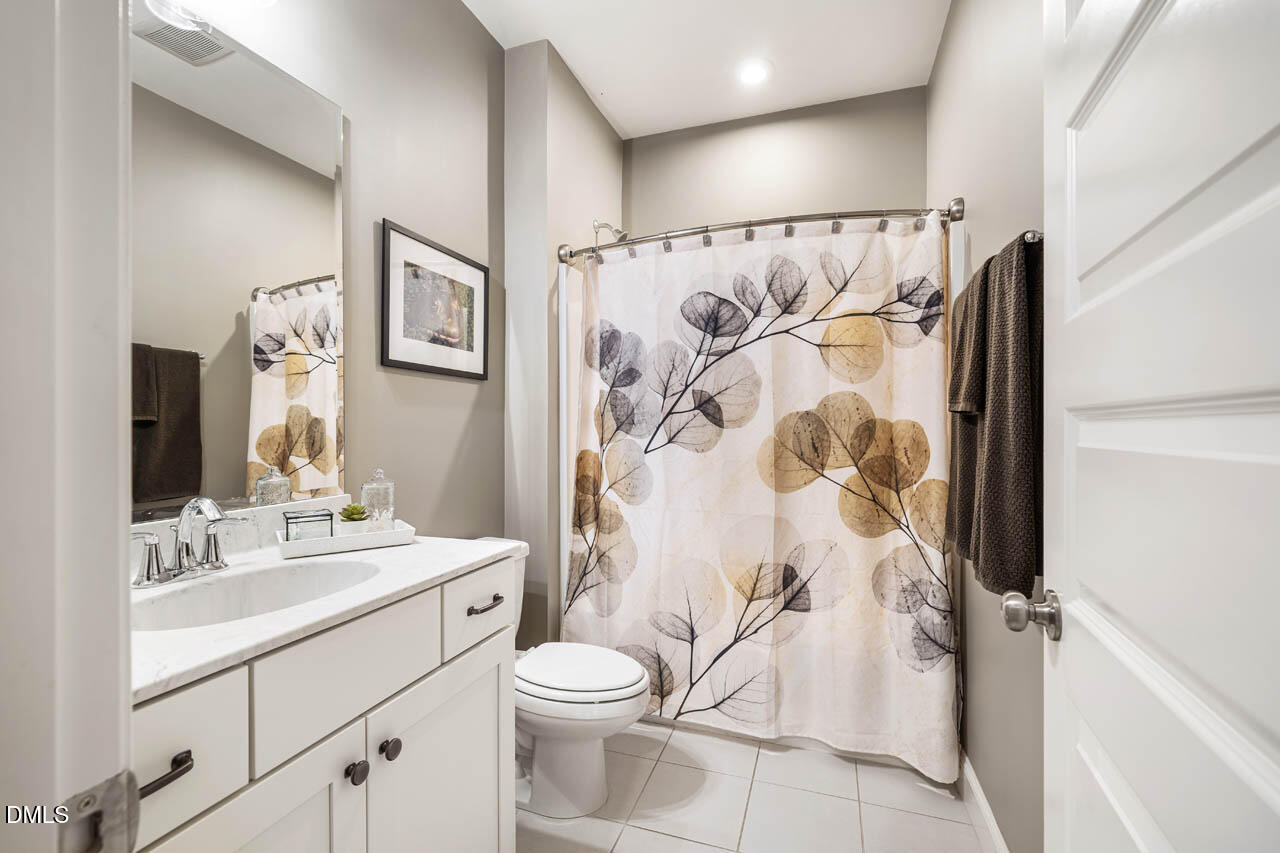 45 Post Oak Road Chapel Hill, NC 27516 - Photo 33 of 89 a bathroom with a sink and a mirror