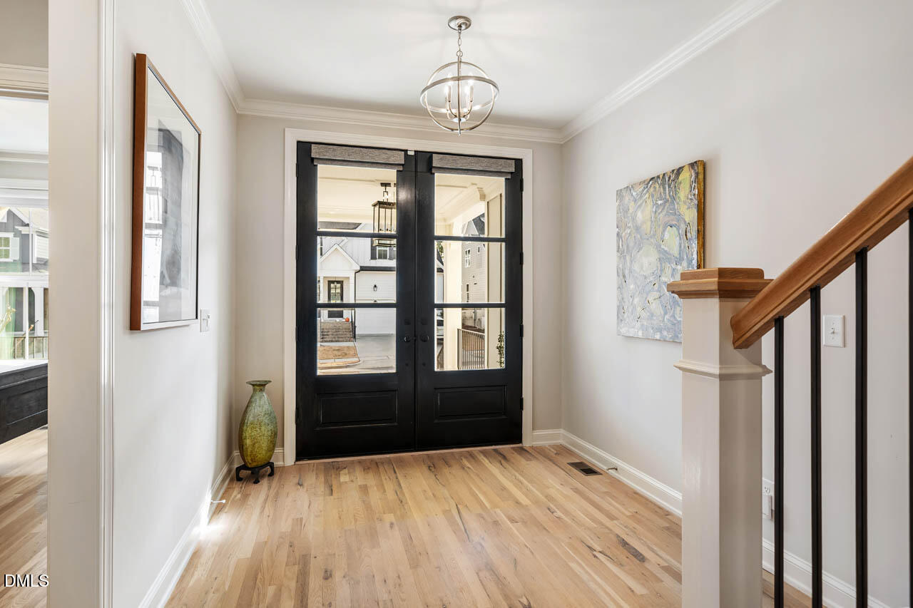 45 Post Oak Road Chapel Hill, NC 27516 - Photo 8 of 89 a view of empty room with wooden floor and fan