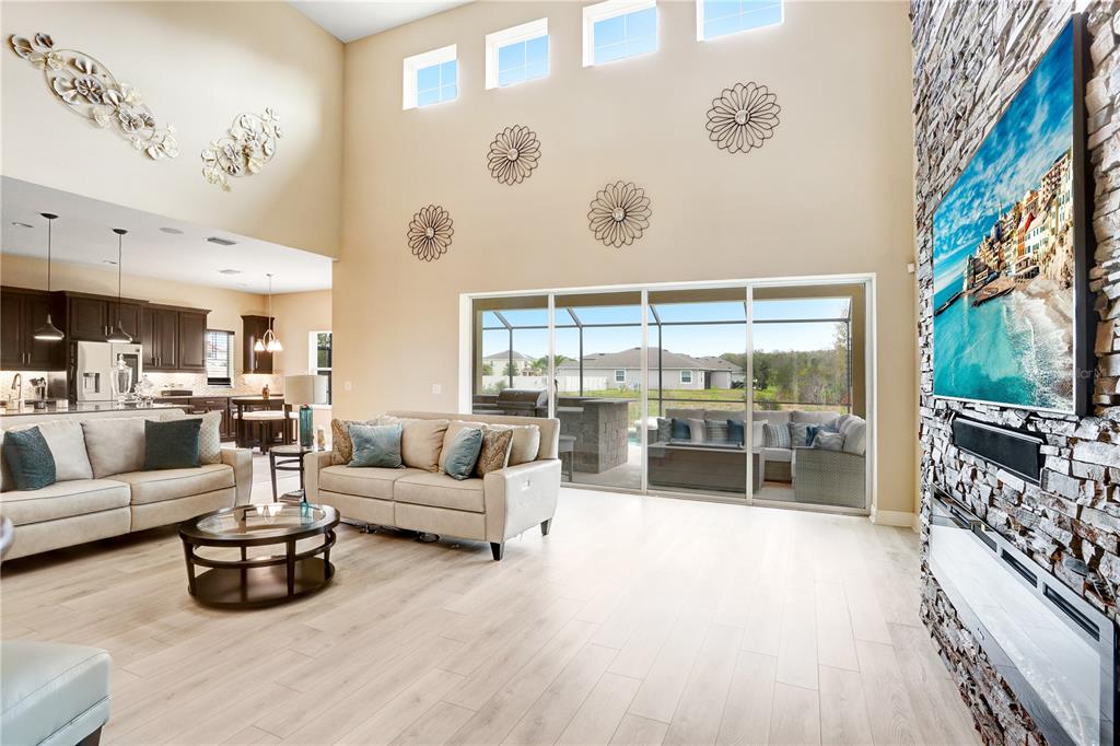 32450 Talimena Loop Wesley Chapel, FL 33543 - Photo 12 of 68 a living room with furniture and a large window