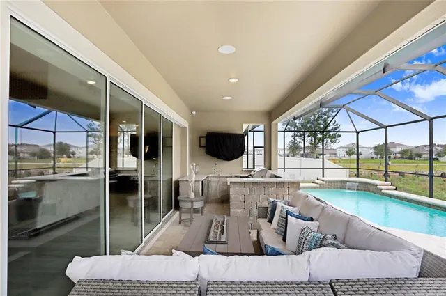 a kitchen with a table and chairs