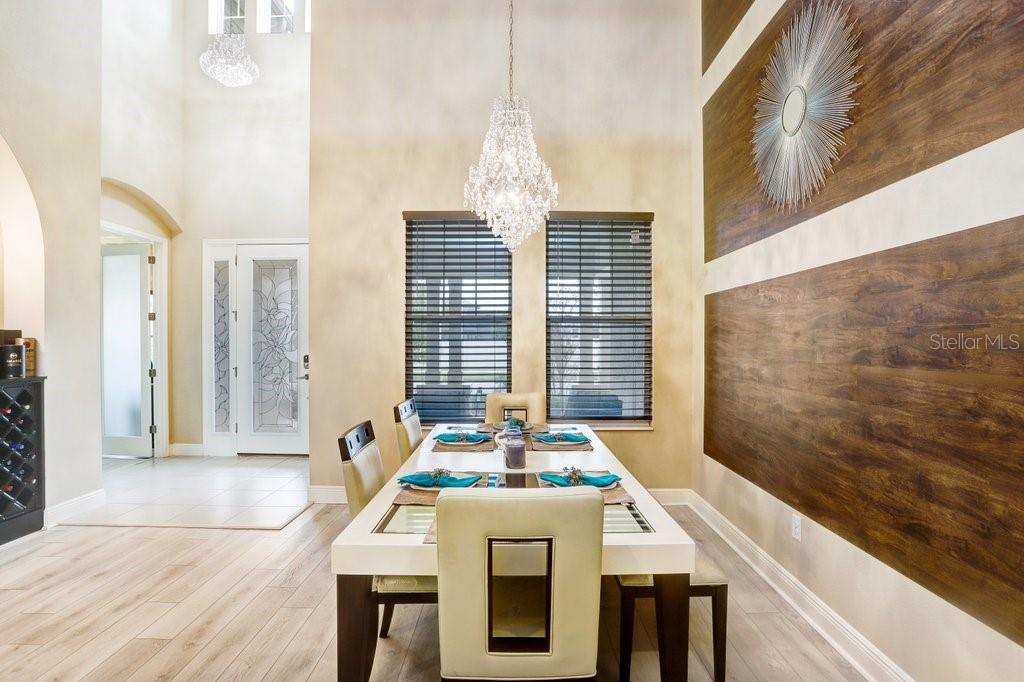 32450 Talimena Loop Wesley Chapel, FL 33543 - Photo 10 of 68 a dining room with furniture and window