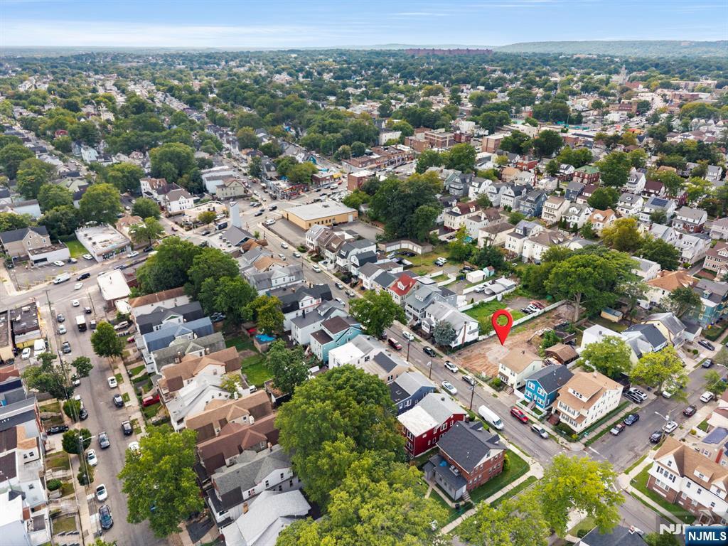 39 Grand Newark, NJ 07106 - Photo 3 of 11 an aerial view of residential houses with outdoor space and parking space