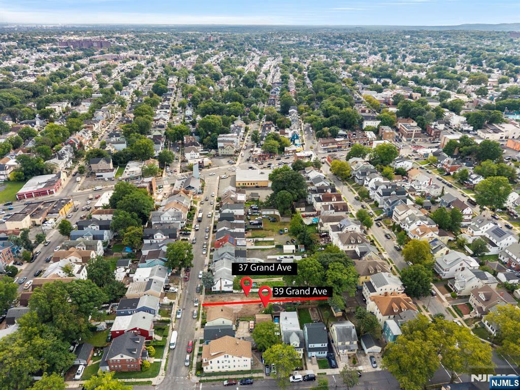 39 Grand Newark, NJ 07106 - Photo 8 of 11 an aerial view of residential houses with outdoor space