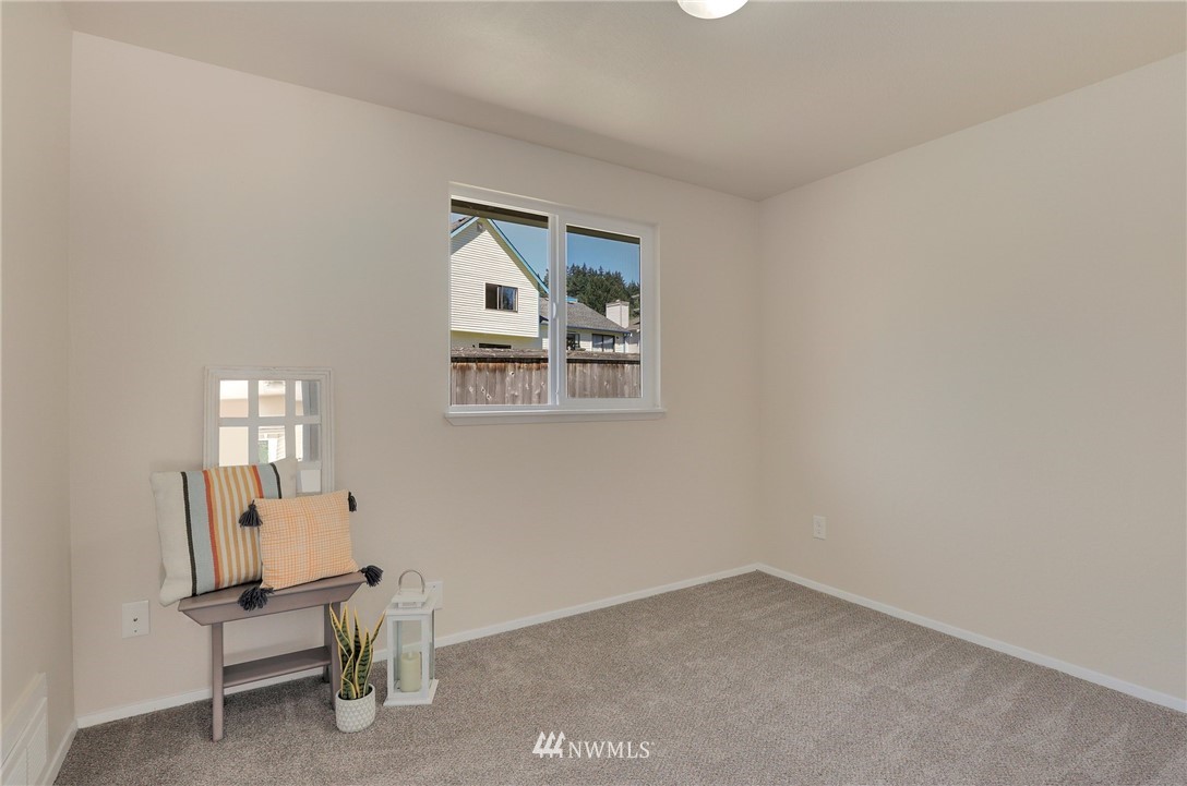 1017 234th Place Southwest Bothell, WA 98021 - Photo 19 of 28 a view of wooden floor and workspace in a room