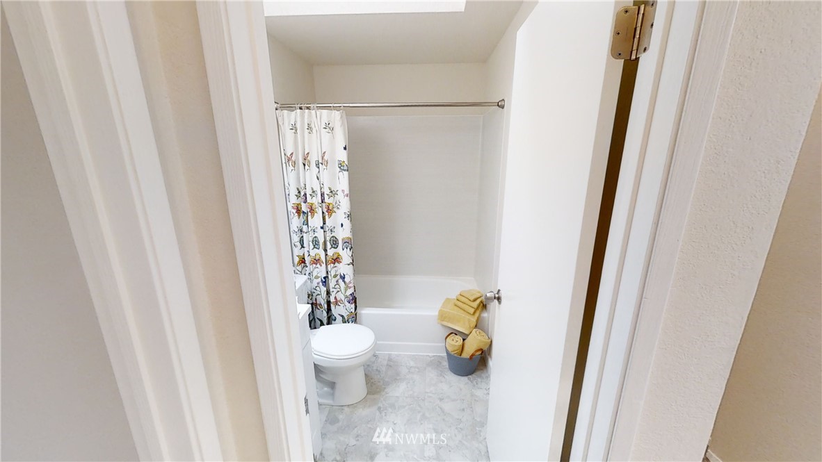 1017 234th Place Southwest Bothell, WA 98021 - Photo 20 of 28 a view of a bathroom with a sink and toilet