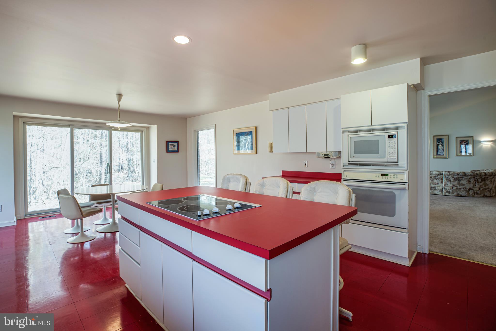 19 Winning Colors Road Stafford, VA 22556 - Photo 14 of 33 a kitchen with stainless steel appliances granite countertop a stove refrigerator and a dining table with granite countertop