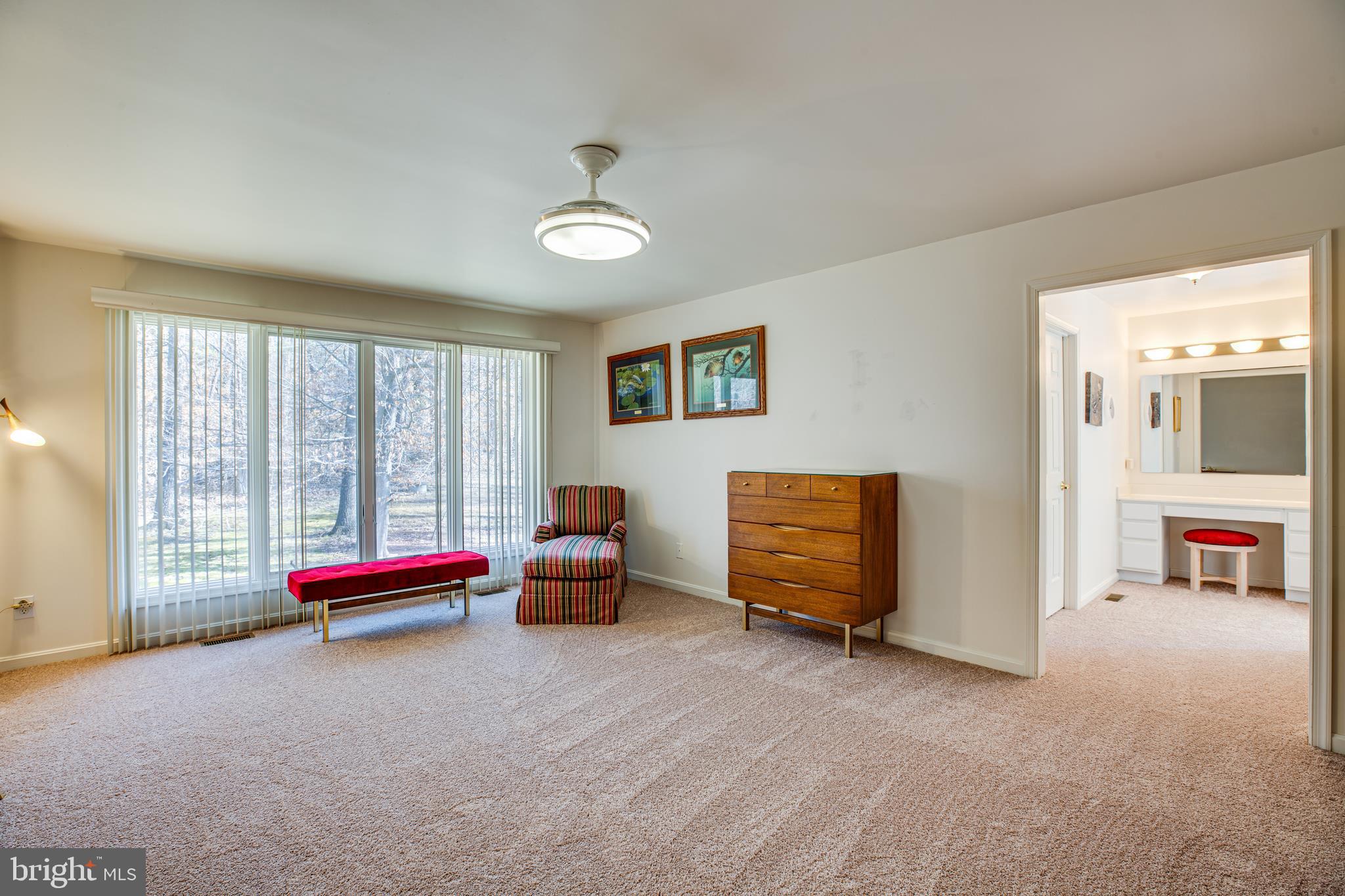 19 Winning Colors Road Stafford, VA 22556 - Photo 17 of 33 a living room with furniture gym equipment and a large window