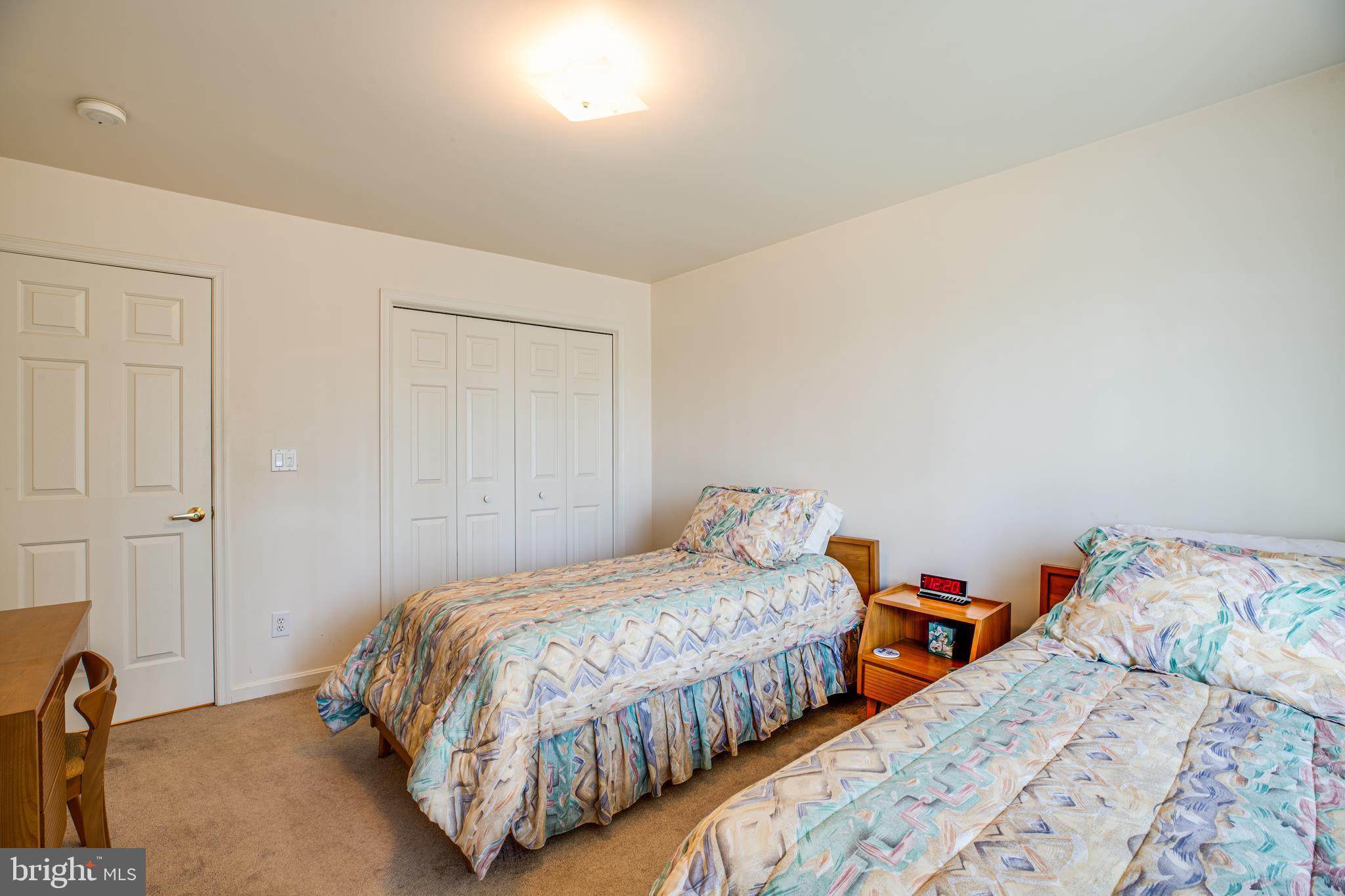 19 Winning Colors Road Stafford, VA 22556 - Photo 23 of 33 a bedroom with two beds and a baby crib