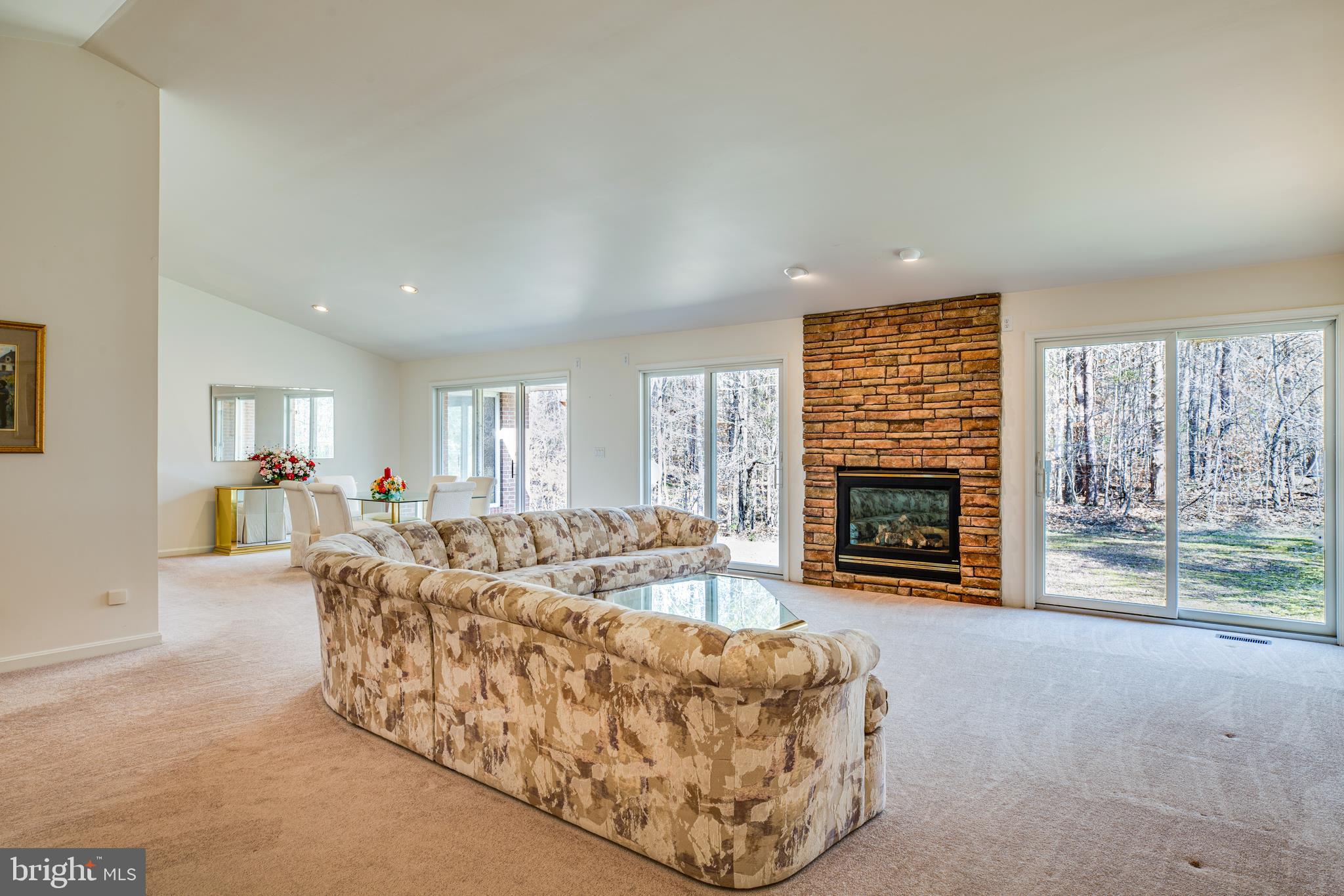 19 Winning Colors Road Stafford, VA 22556 - Photo 5 of 33 a living room with furniture a fireplace and a flat screen tv
