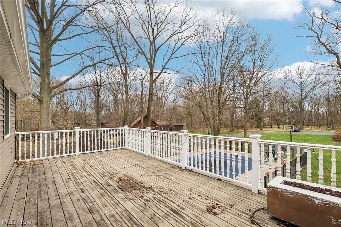 1835 Vermilion Road Vermilion, OH 44089 - Photo 26 of 50 Primary suite deck overlooks the rear yard.