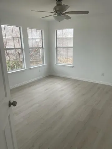 an empty room with windows