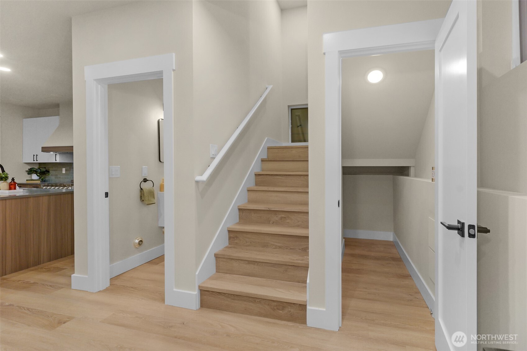 910 15th Avenue Seattle, WA 98122 - Photo 14 of 35 a view of a hallway with wooden floor and entryway