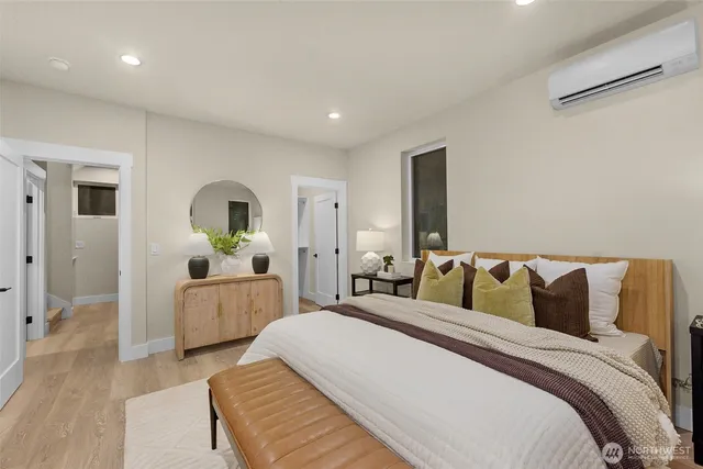 a bathroom with a double vanity sink and mirror