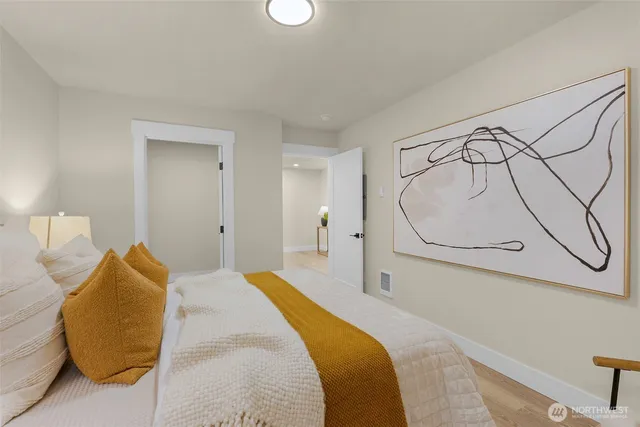 a bathroom with a double vanity sink toilet and shower