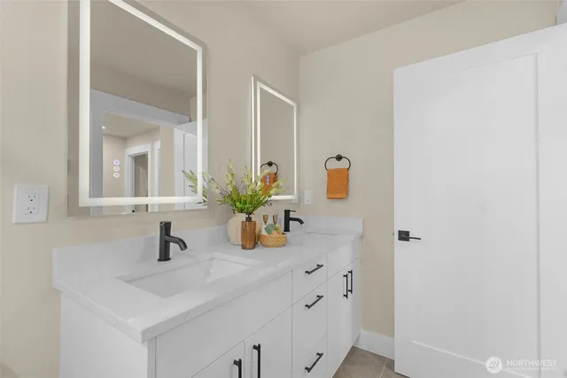 a view of entryway with wooden floor and stairs
