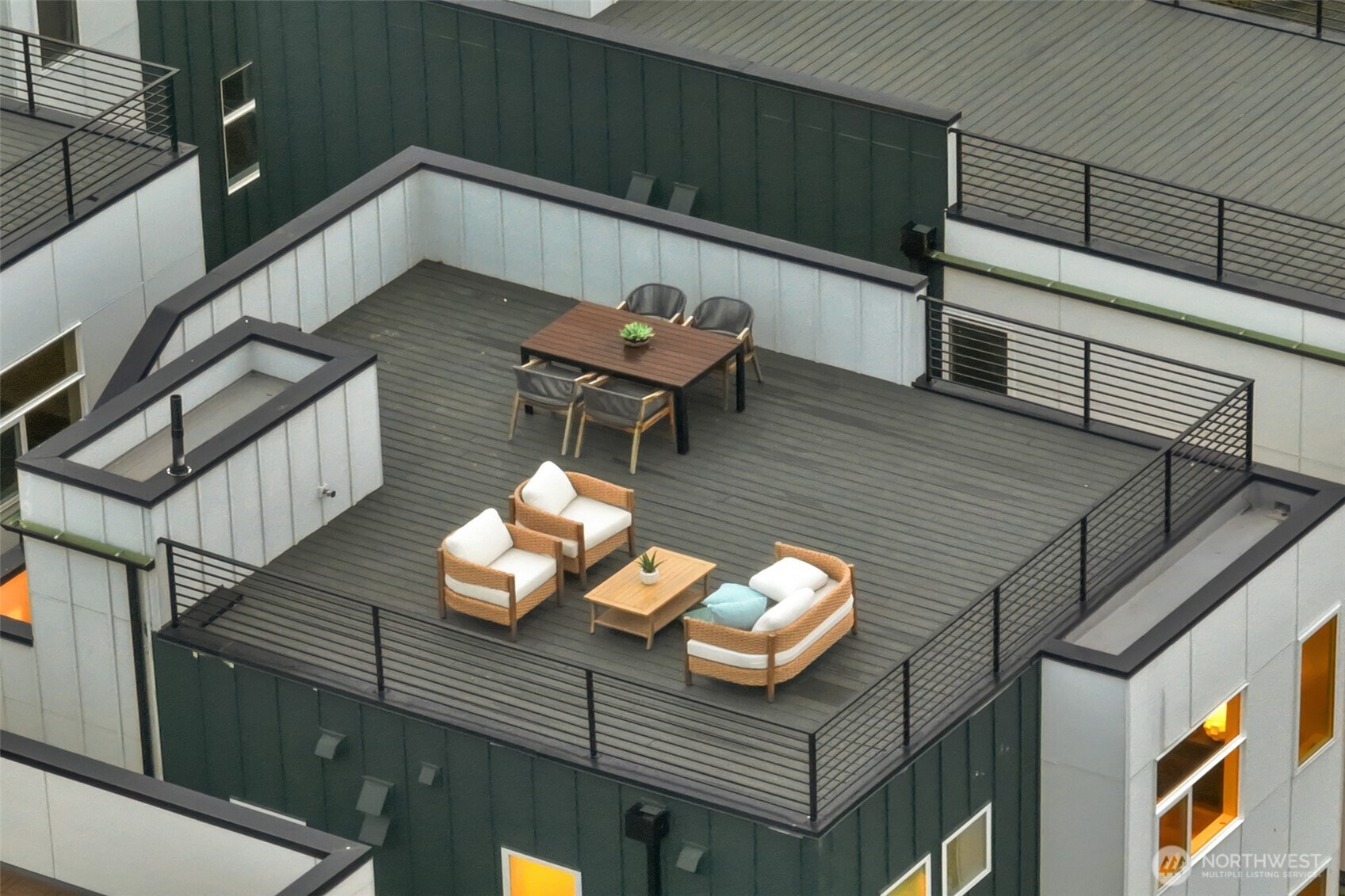 910 15th Avenue Seattle, WA 98122 - Photo 33 of 35 a roof deck with wooden floor and seating space