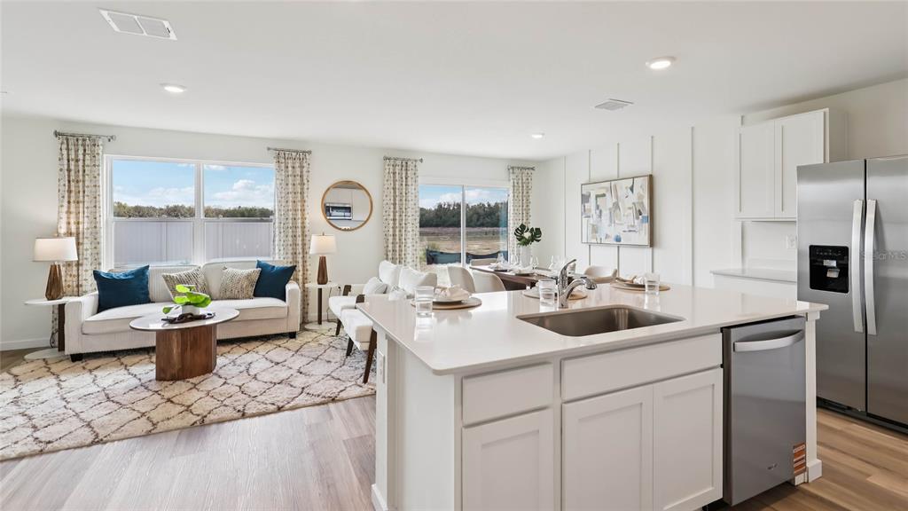 4694 Kona Circle Spring Hill, FL 34608 - Photo 3 of 29 a very nice looking living room with a sink and a large window