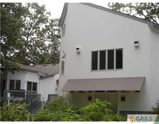 22 Evan Drive Morganville, NJ 07751 - Photo 2 of 14 a view of house with yard