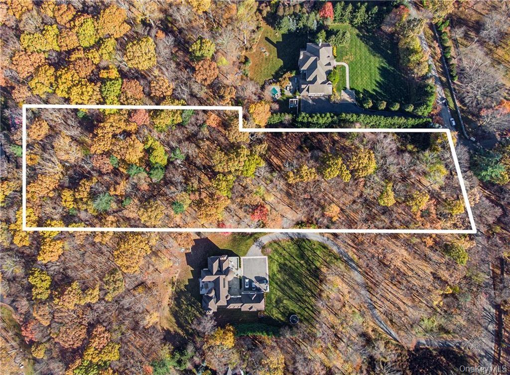 an aerial view of residential house with outdoor space