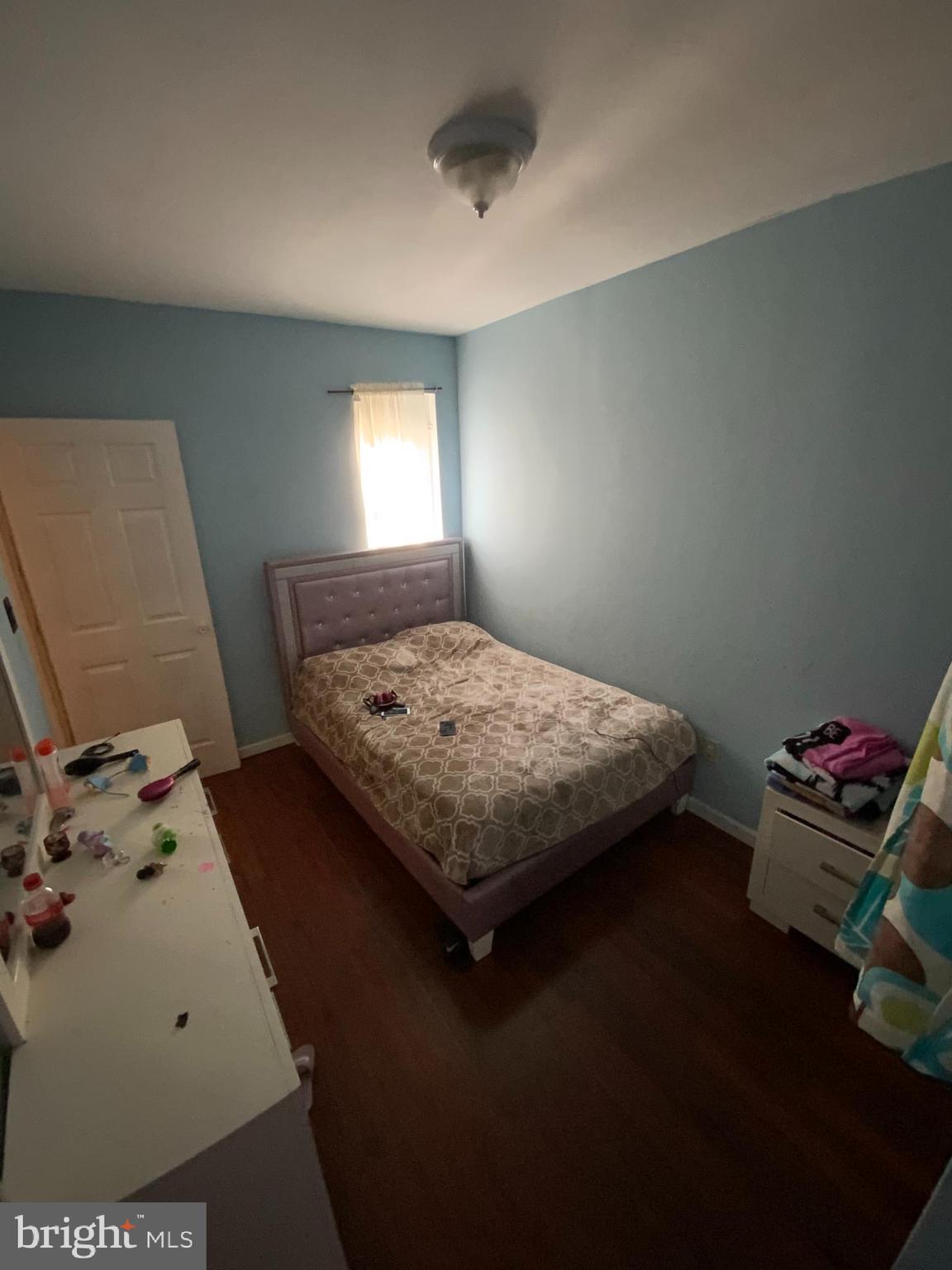 434 Birch Street Reading, PA 19604 - Photo 8 of 12 a bedroom with a bed and window