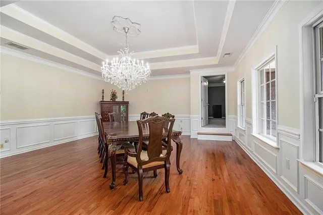 a bathroom with a toilet and a mirror