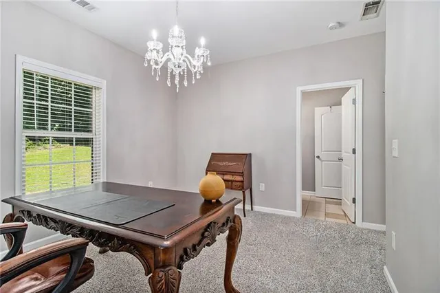 a bath room with sink and mirror