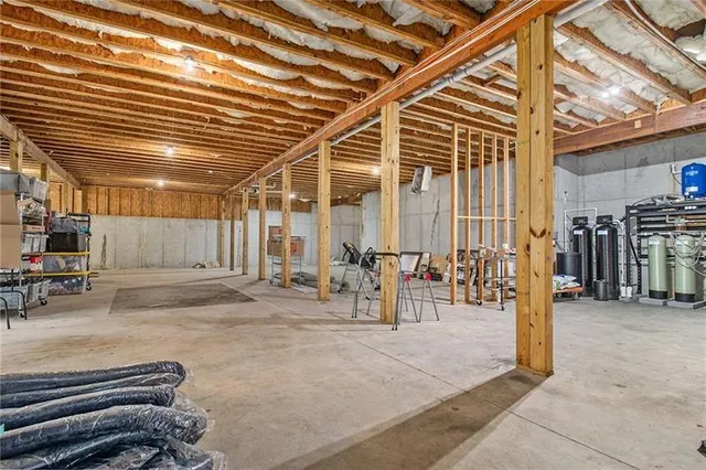 a view of a balcony with wooden floor and fence