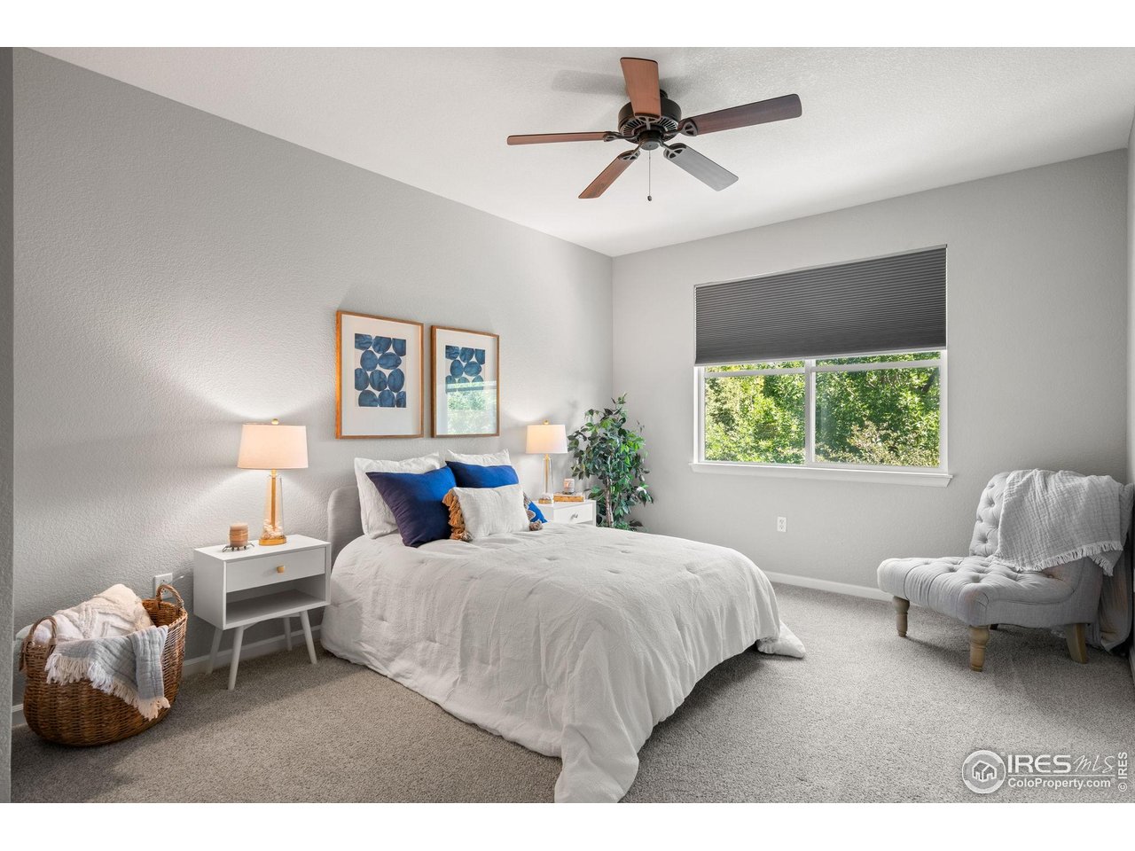 4501 Nelson Road, Unit 2105 Longmont, CO 80503 - Photo 20 of 37 Extra spacious primary bedroom with eastern exposure and treetop views