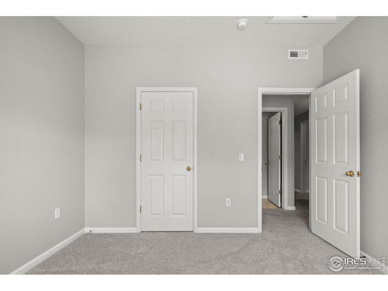 4501 Nelson Road, Unit 2105 Longmont, CO 80503 - Photo 24 of 37 2nd bedroom directly across from 2nd bathroom