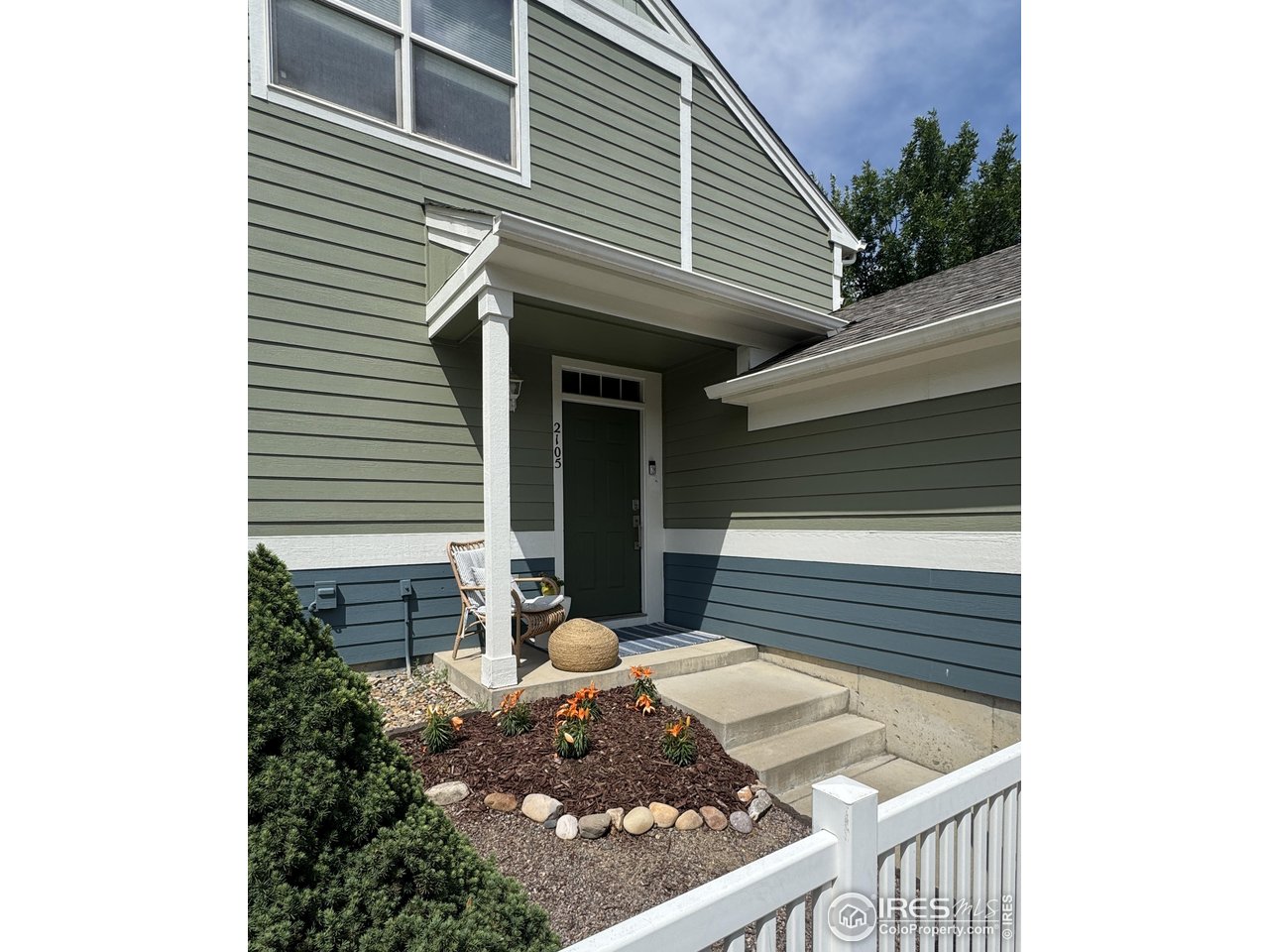 Gated garden area and front stoop