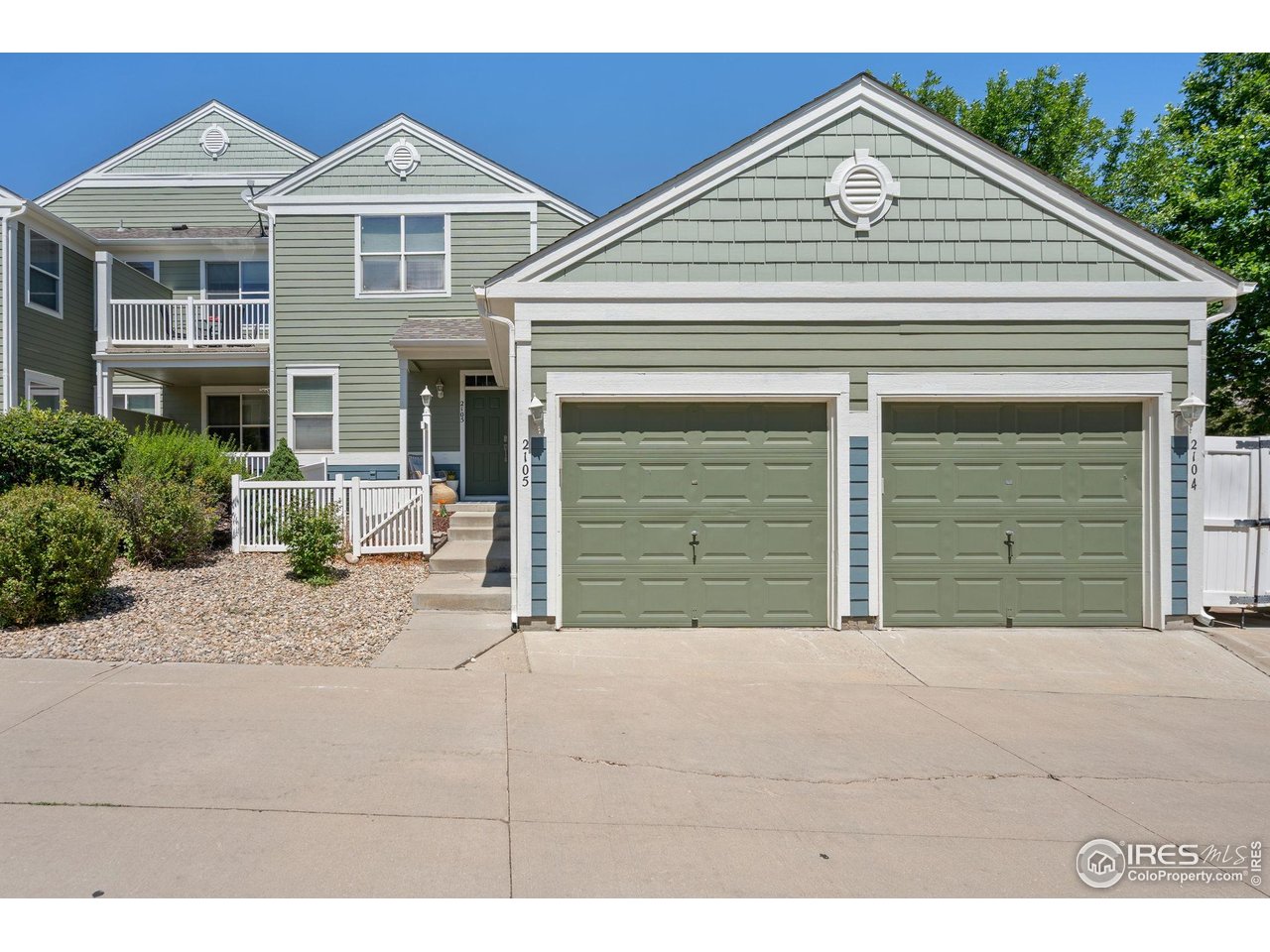 Spacious attached garage with additional storage