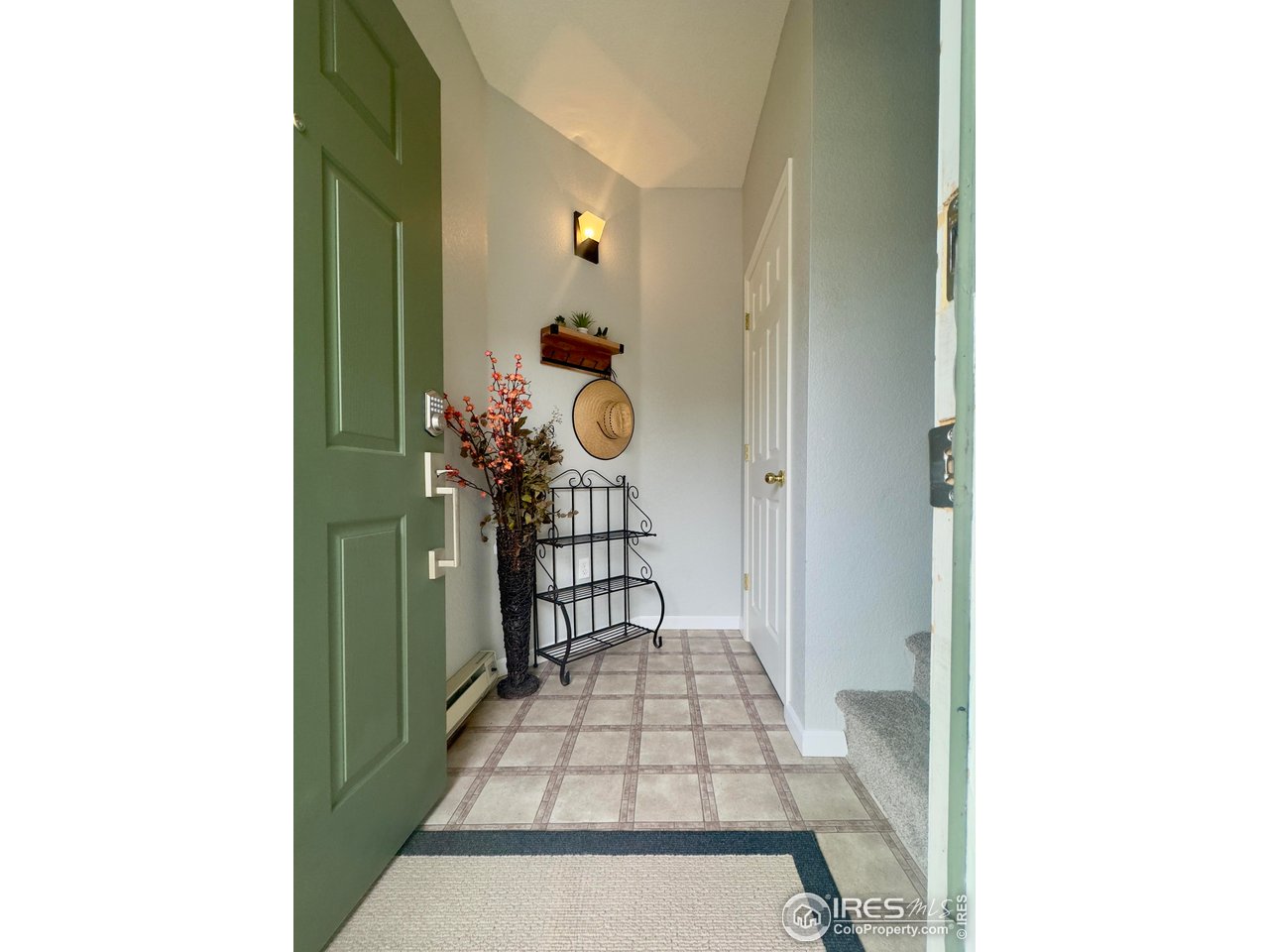 Entryway with coat closet and extra storage space