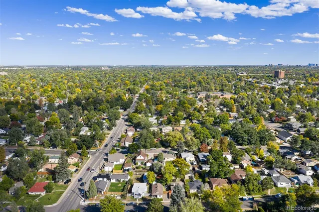 a picture of a bench in front of a wall