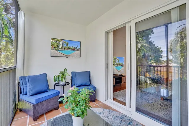 a view of living room filled with furniture