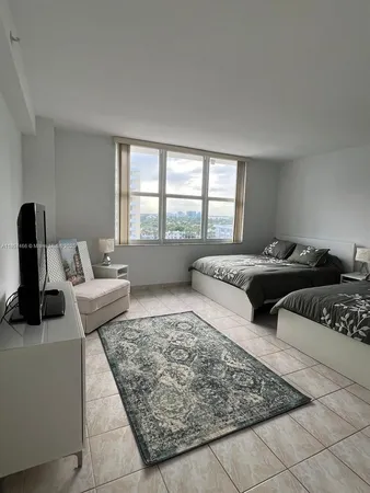 a living room with furniture and floor