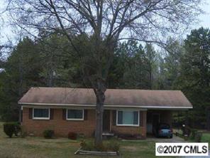 3965 Marshall Road Rock Hill, SC 29730 - Photo 1 of 4 a front view of a house with a garden and tree