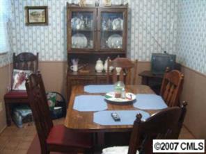 3965 Marshall Road Rock Hill, SC 29730 - Photo 4 of 4 a view of a dining room with furniture and chandelier
