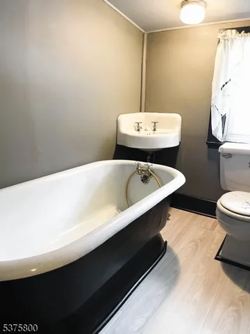 a bathroom with a sink and a toilet