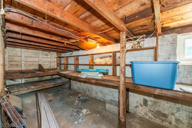 a very nice looking living room with a large window