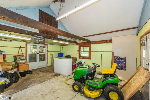 a view of a field of grass and trees