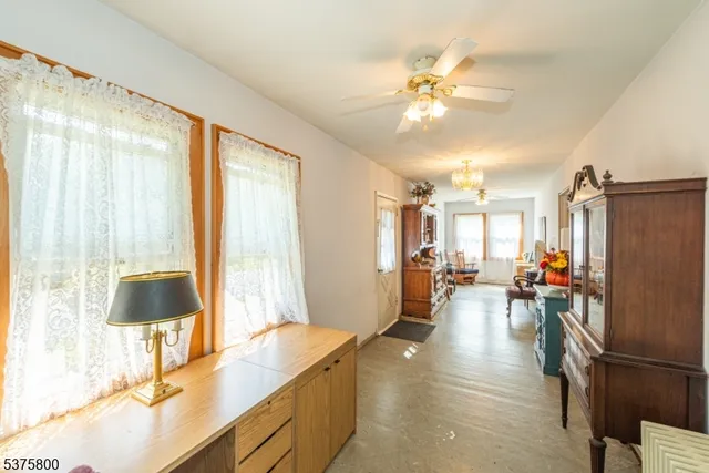 a view of a living room and dining room