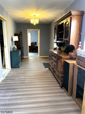 a kitchen with stainless steel appliances kitchen island granite countertop a stove and a sink